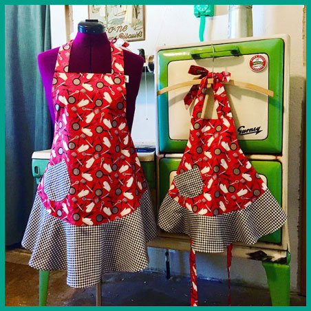 Picture of something you can make in Machine Sewing 101 - matching aprons for woman and child.